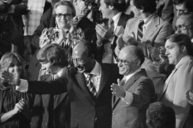 Egyptian President Anwar Sadat and Israeli Prime Minister Menachem Begin acknowledge applause during a Joint Session of Congress in which President Jimmy Carter announced the results of the Camp David Accords.