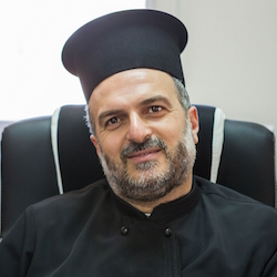 Photo of Father Naddaf, Zionist Israeli Arab Christian priest