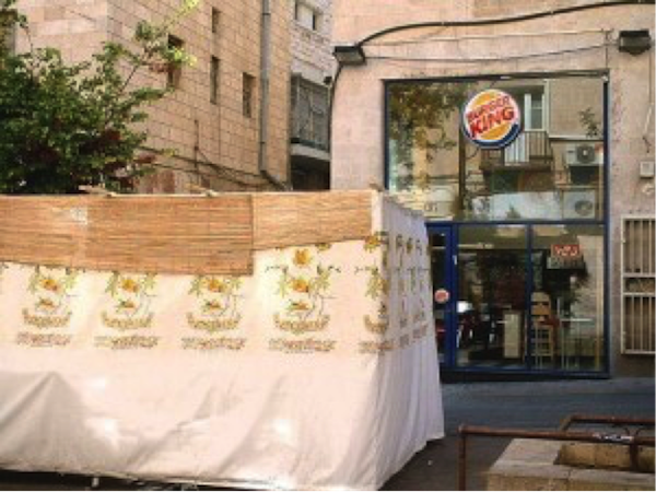 Sukka in front of kosher Burger King (photo credit: Judy Lash Balint)